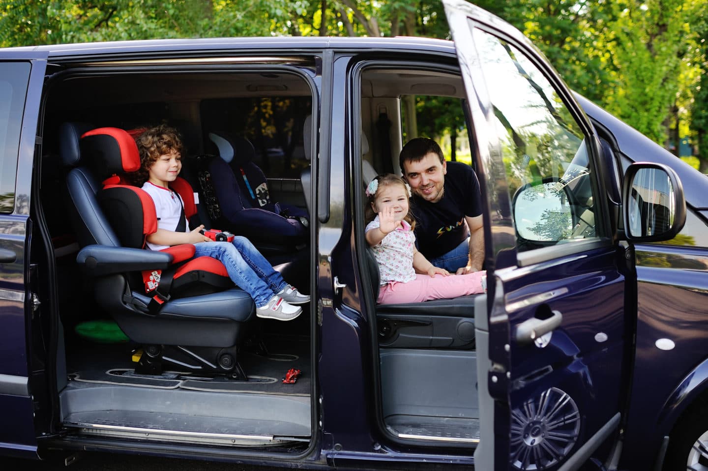 Child safely secured in a car seat